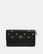 COACH®,FOLDOVER WRISTLET WITH GROMMETS,Gold/Black,Front View