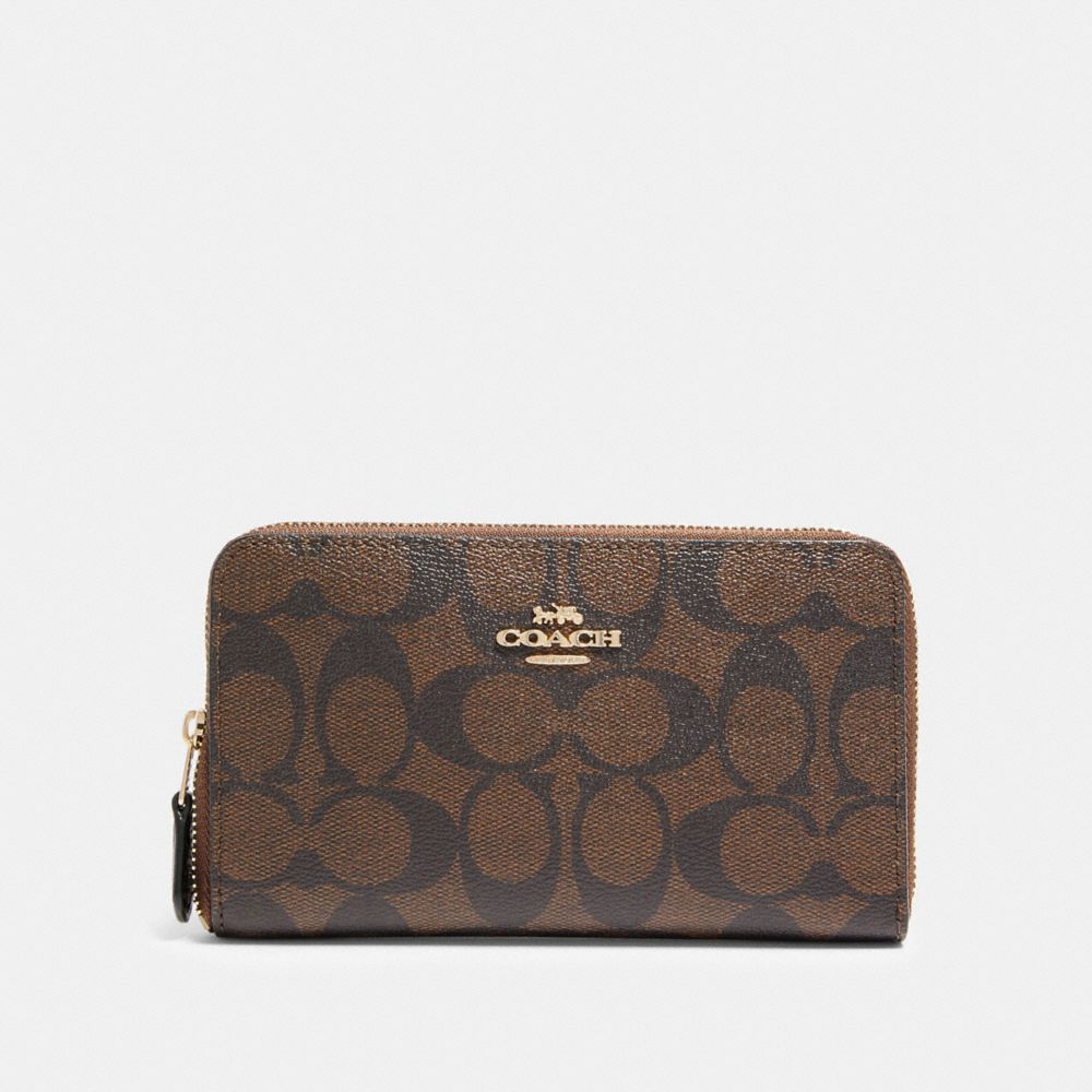 COACH® Outlet | Medium Id Zip Wallet In Signature Canvas