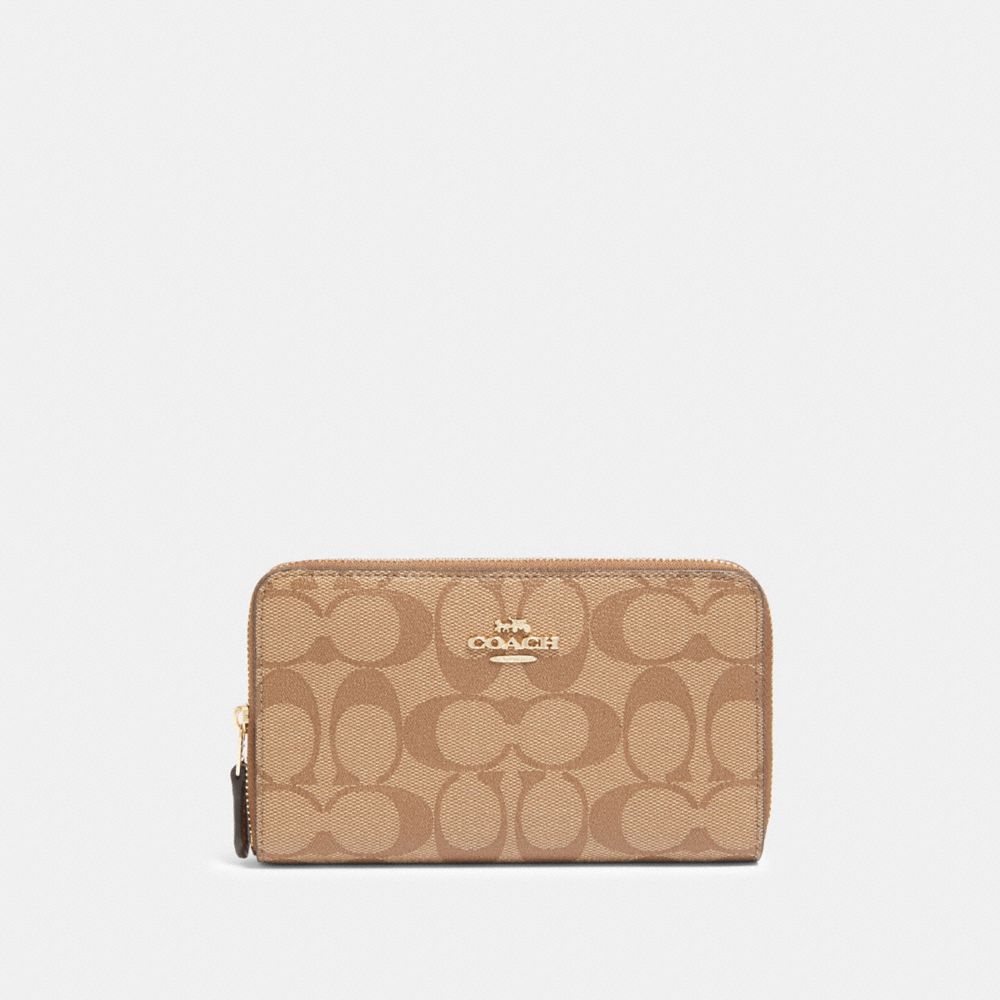 COACH®,Medium Id Zip Wallet In Signature Canvas,,Front View