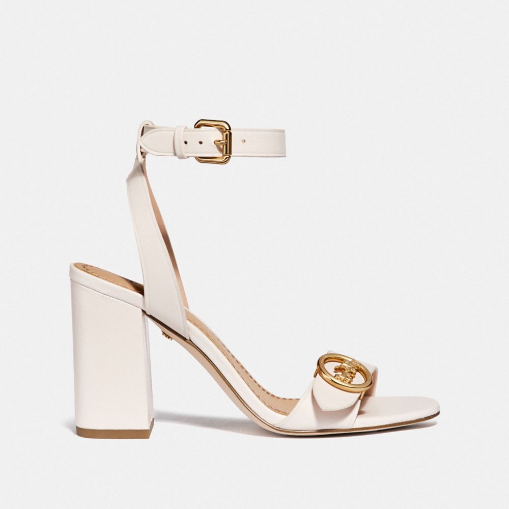 Coach store white heels