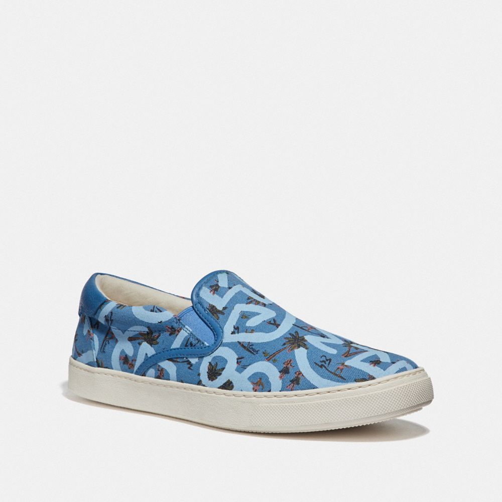 COACH Outlet COACH Outlet Keith Haring C117 Slip On Sneaker With Hula Dance Print