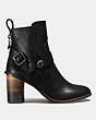 COACH®,MOTO BOOTIE HEEL,Leather,Black,Angle View
