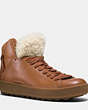 COACH®,SHEARLING C201 HIGHTOP SNEAKER,Mixed Material,Saddle/Natural,Front View