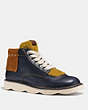 COACH®,HIGH TOP TROOPER WITH SHEARLING,Leather,Navy/Teak/Mustard,Front View