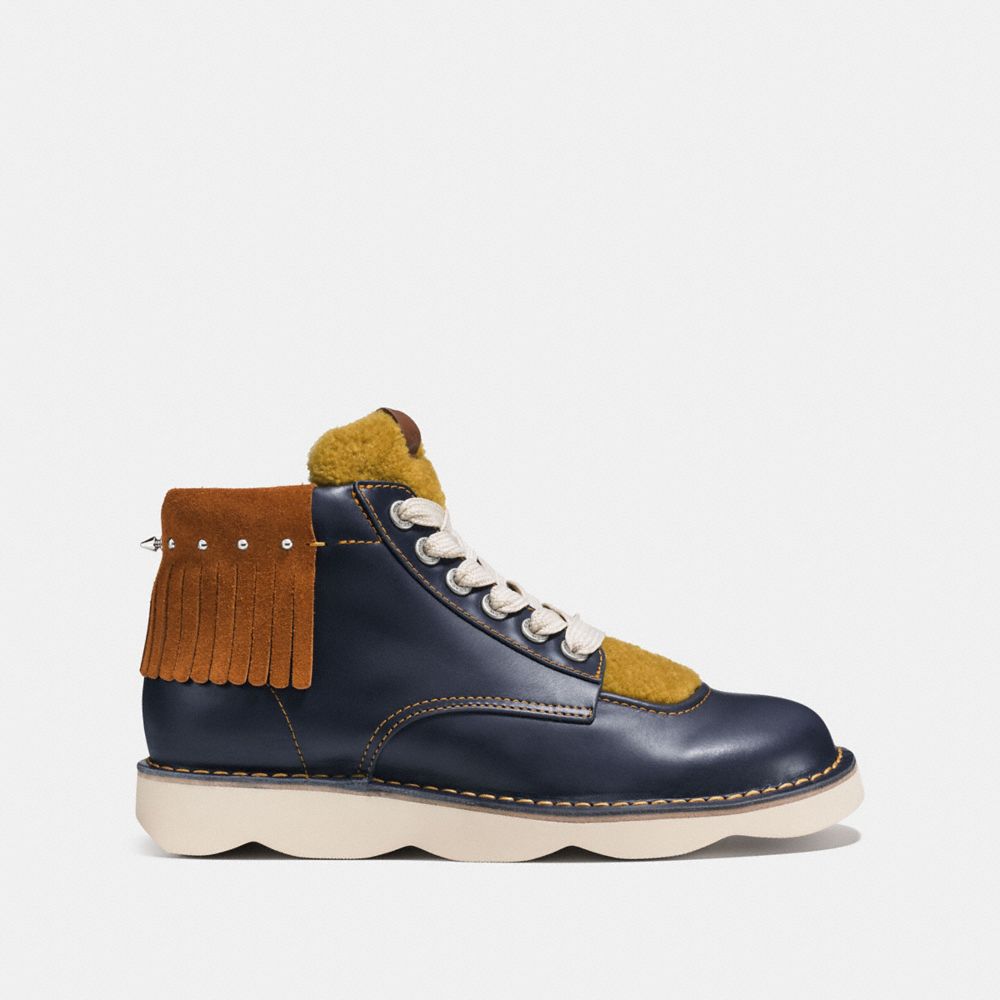 COACH®,HIGH TOP TROOPER WITH SHEARLING,Leather,Navy/Teak/Mustard,Angle View