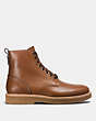 COACH®,DERBY BOOT,Leather,Dark Saddle,Angle View