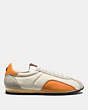 COACH®,C122 LOW TOP SNEAKER,Mixed Material,Chalk/Burnt Orange,Angle View