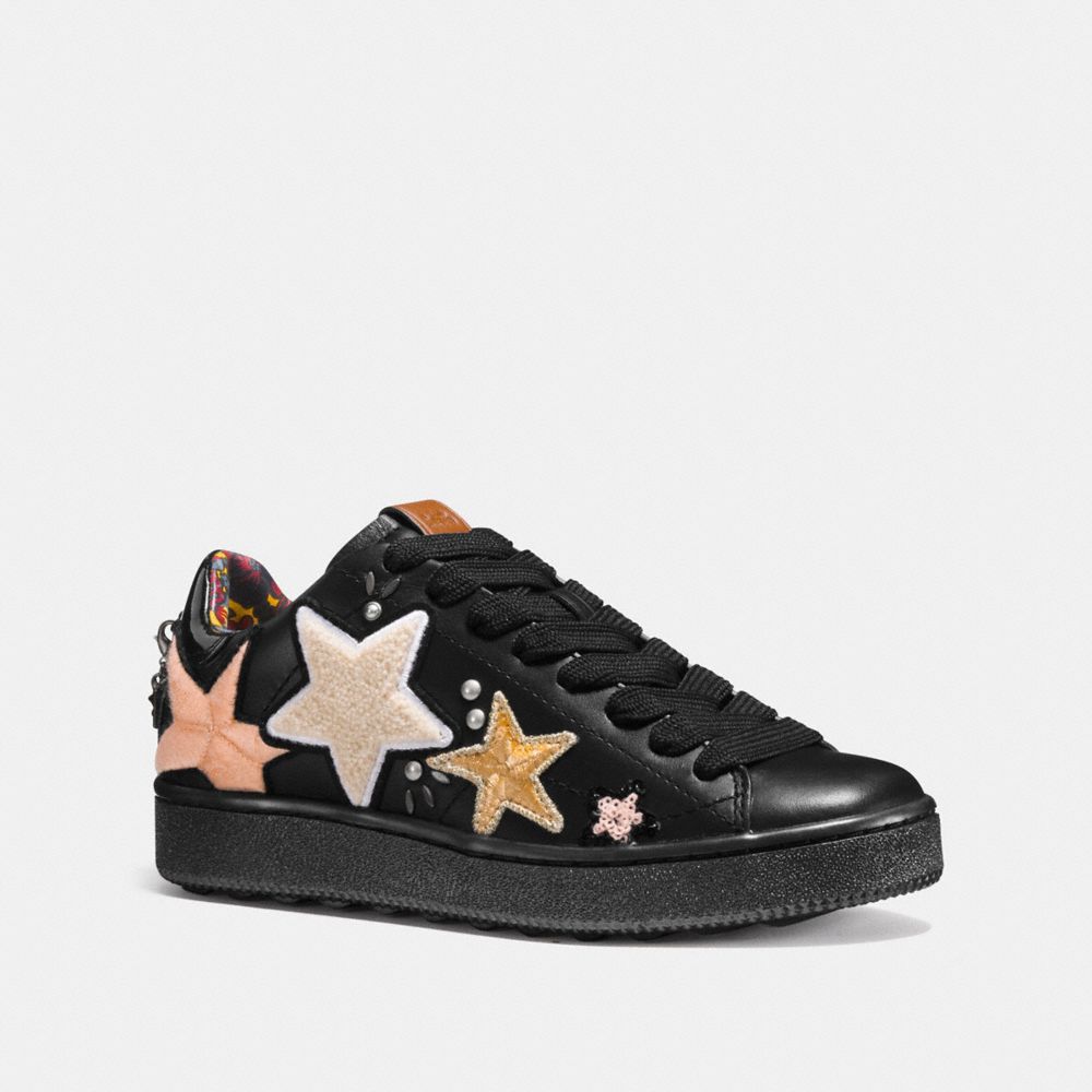 Chaussures de sport basses avec pièces écusson en étoiles C101