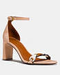 COACH®,HEEL SANDAL WITH COACH LINK,Mixed Material,Beechwood/Chalk/Saddle,Front View