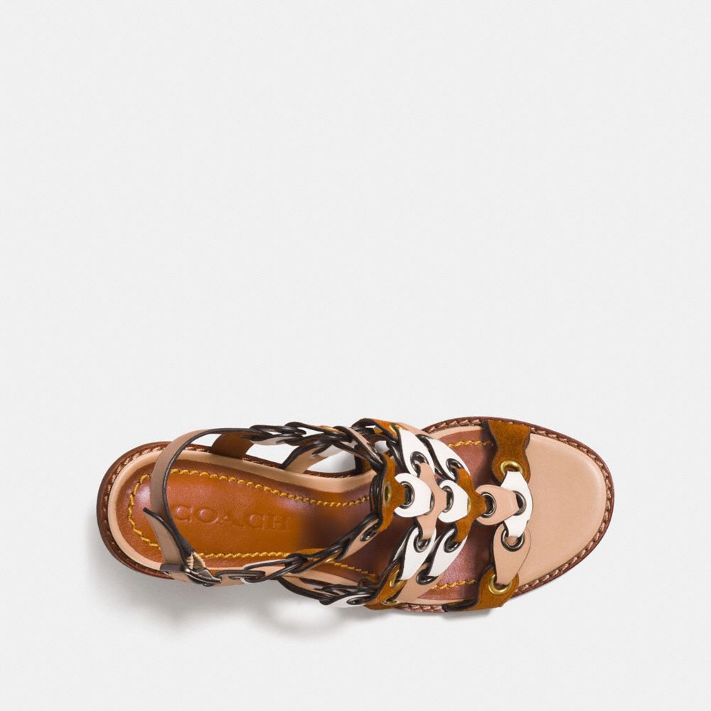 Mid heel sandal on sale with coach link