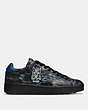 COACH®,COACH X KEITH HARING C101 LOW TOP SNEAKER,Leather,Keith Haring Hawaiian Black,Angle View
