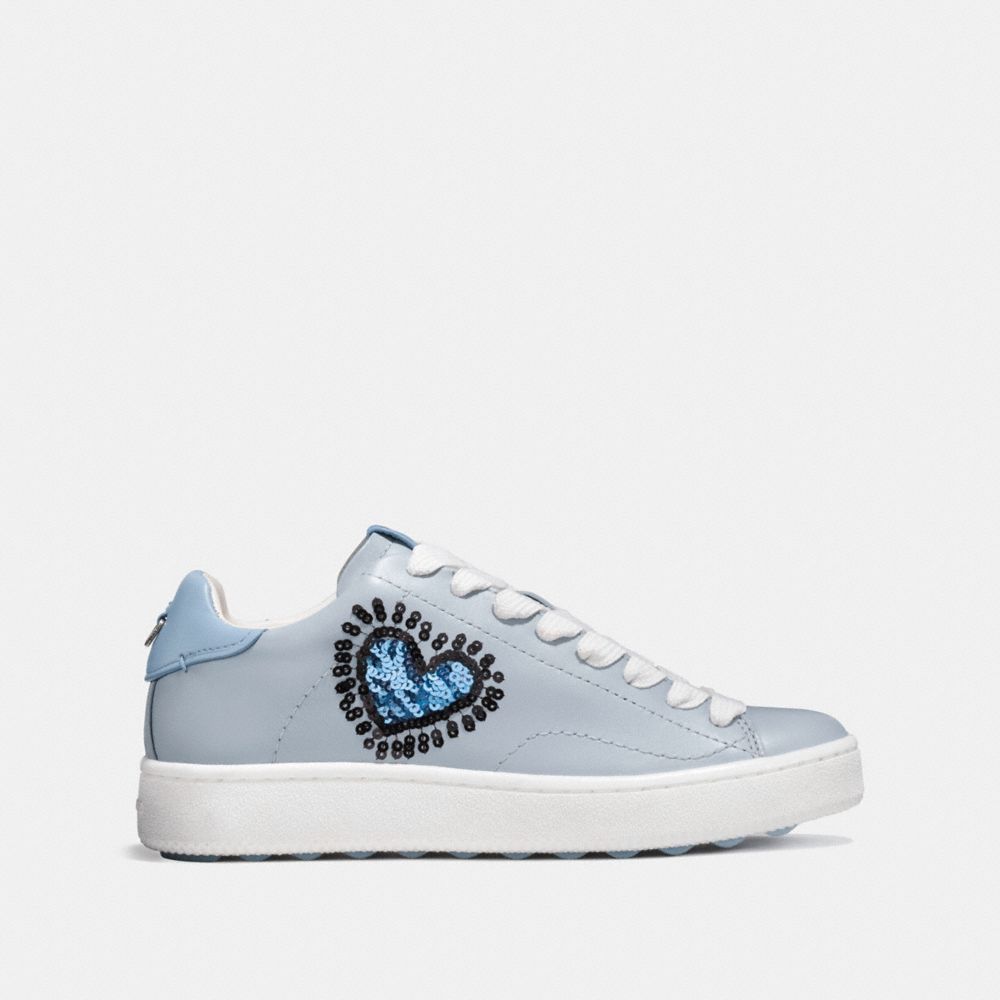 COACH®,COACH X KEITH HARING C101 LOW TOP SNEAKER,Leather,Azure/Artic,Angle View