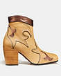 COACH®,WESTERN BOOTIE WITH BURNISH,Leather,Marigold/Bronze,Angle View