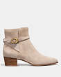 COACH®,CHRYSTIE BOOTIE,Suede,Oat,Angle View