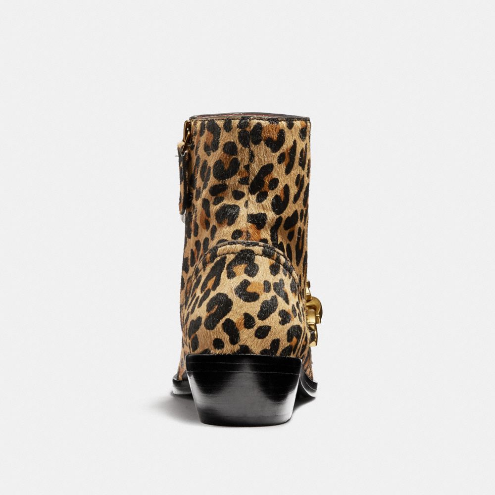 Coach leopard boots best sale