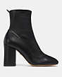 COACH®,GIANA STRETCH BOOTIE,Leather,Black,Angle View