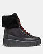 COACH®,TYLER BOOT,Mixed Material,Black,Angle View