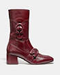 COACH®,SIGNATURE BUCKLE BOOTIE,Leather,Cognac,Angle View
