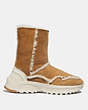 COACH®,PORTIA COLD WEATHER BOOTIE,Shearling,CAMEL/NATURAL,Angle View