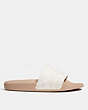 COACH®,UDELE SPORT SLIDE IN SIGNATURE CANVAS,Signature Coated Canvas/Rubber,Chalk/Taupe,Angle View