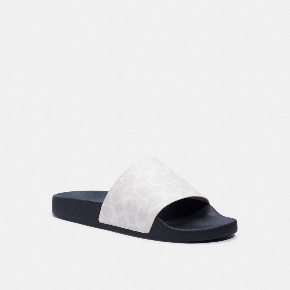 Coach udele discount signature rubber slides