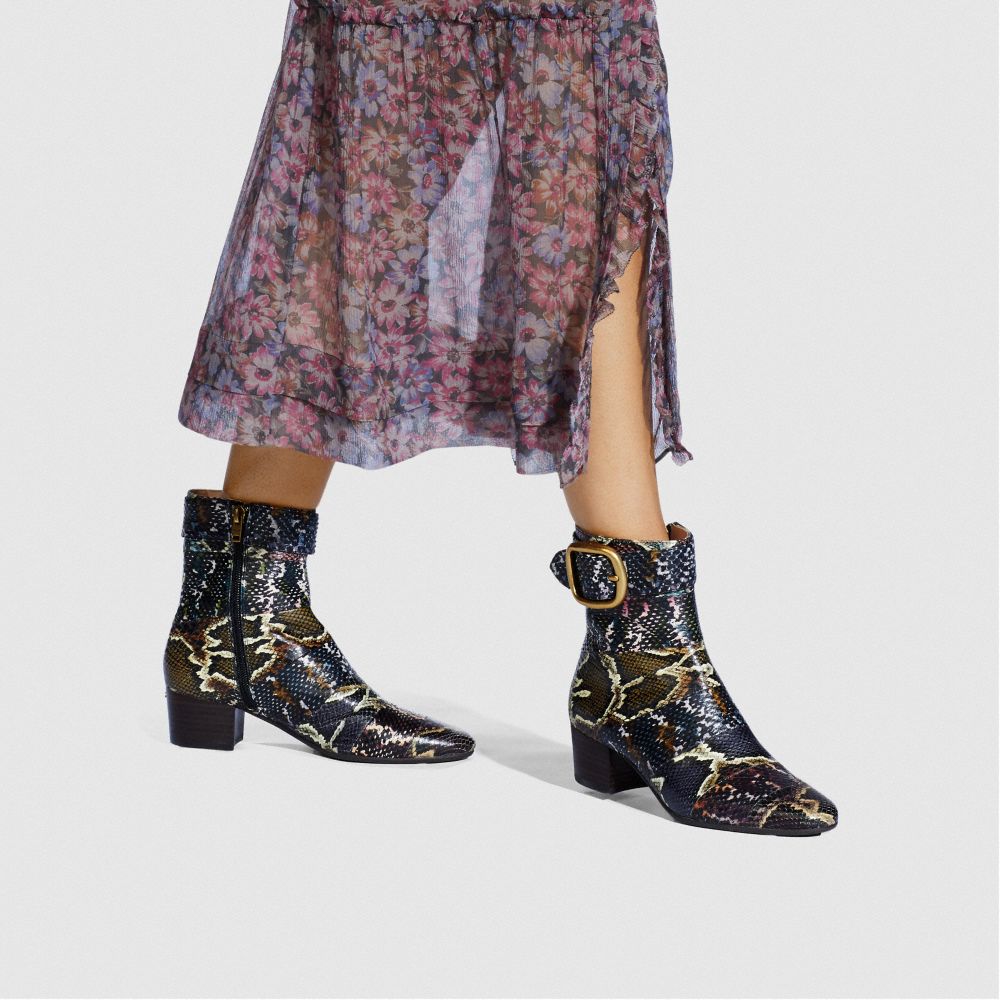 Coach hotsell snakeskin boots