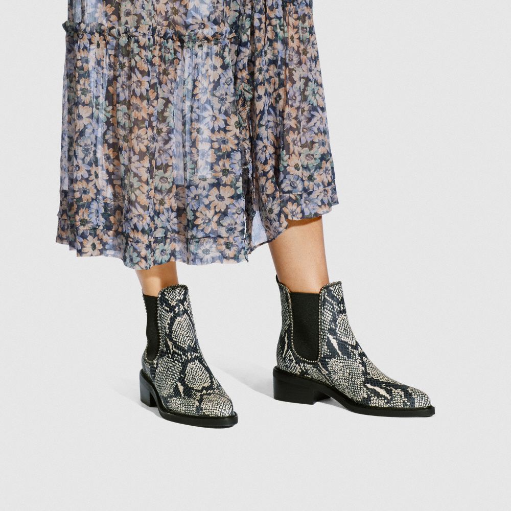 Coach snakeskin hot sale boots