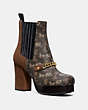 COACH®,CHELSEA PLATFORM BOOTIE WITH HORSE AND CARRIAGE PRINT,mixedmaterial,Brown/Saddle,Front View