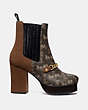 COACH®,CHELSEA PLATFORM BOOTIE WITH HORSE AND CARRIAGE PRINT,mixedmaterial,Brown/Saddle,Angle View