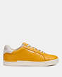 COACH®,CLIP LOW TOP SNEAKER,Leather,Ochre,Angle View