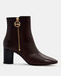 COACH®,IRIS BOOTIE,Leather,Cranberry,Angle View