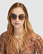 COACH®,THIN METAL ROUND SUNGLASSES,Metal,Light Gold/Gold Mirror,Angle View
