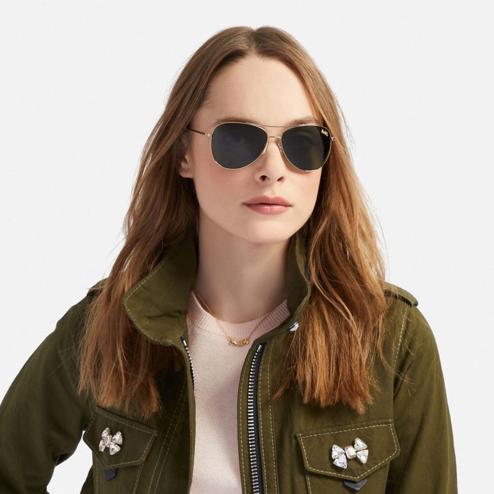 COACH®,Thin Metal Pilot Sunglasses,,Angle View