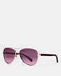 COACH®,HORSE AND CARRIAGE PILOT SUNGLASSES,Shiny Li Gold/Berry,Front View