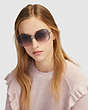 COACH®,OPEN WIRE SUNGLASSES,Metal,Gunmetal/Pink Brown Gradient,Angle View