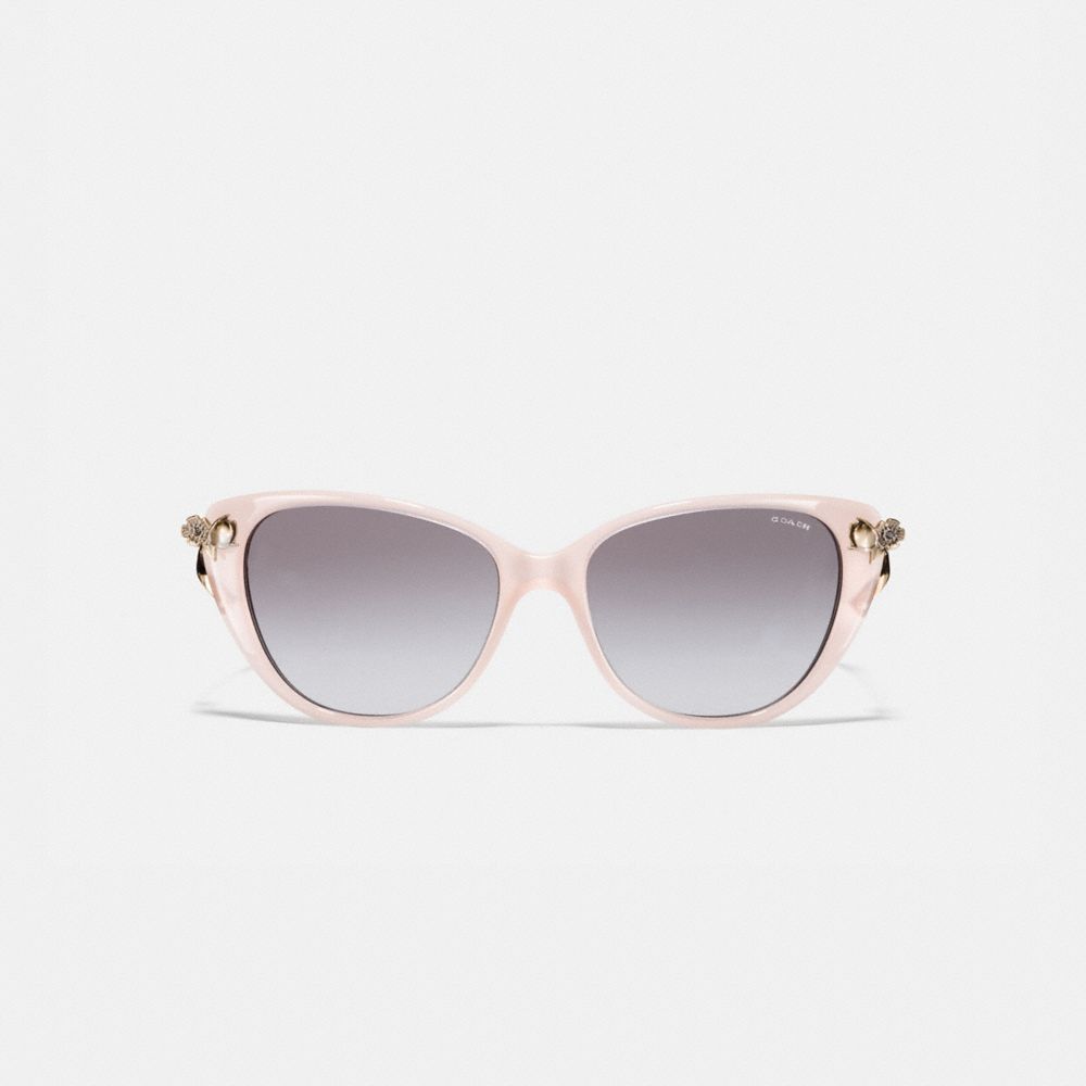 Lunettes de soleil rose thé