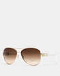 COACH®,CHRISTINA SUNGLASSES,Metal,Gold/White,Front View