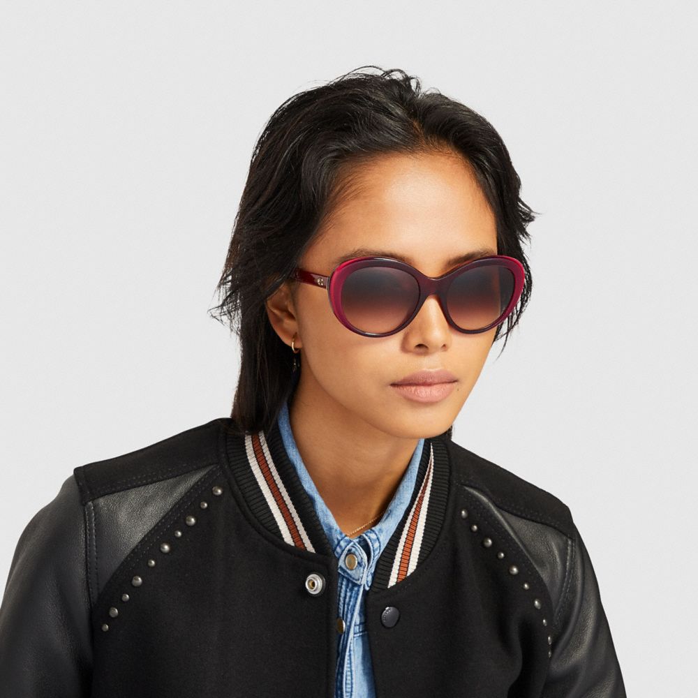 COACH®,Beveled Edge Oval Sunglasses,,Angle View