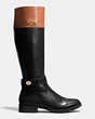 COACH®,EVA BOOT,Leather,Black/Saddle,Angle View