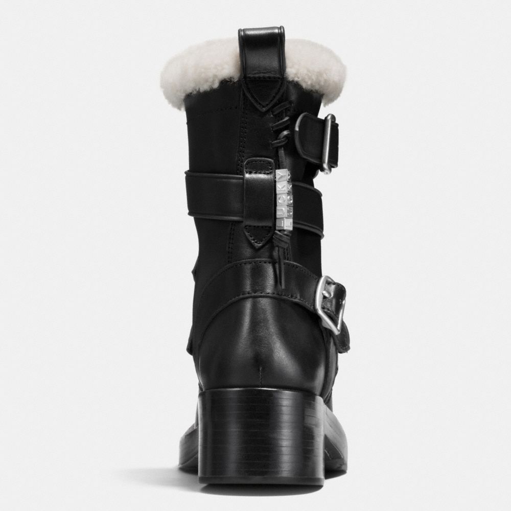 COACH®: Zip Moto Boot