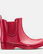 COACH®,TYLER RAINBOOT,Rubber,True Red,Angle View