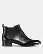 COACH®,SUFFOLK PATCHWORK BOOTIE,Mixed Material,Black,Angle View