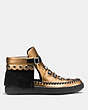 COACH®,ROCCASIN CUT OUT SNEAKER,Leather,Copper Black/Black,Angle View