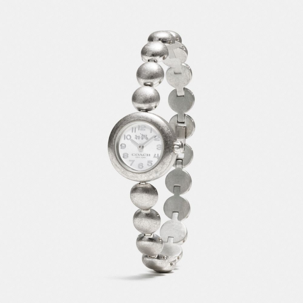 Montre bracelet en acier inoxydable à rivets Coach