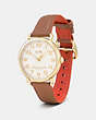 COACH®,75TH ANNIVERSARY DELANCEY GOLD PLATED LEATHER STRAP WATCH,Leather,Tabac,Angle View